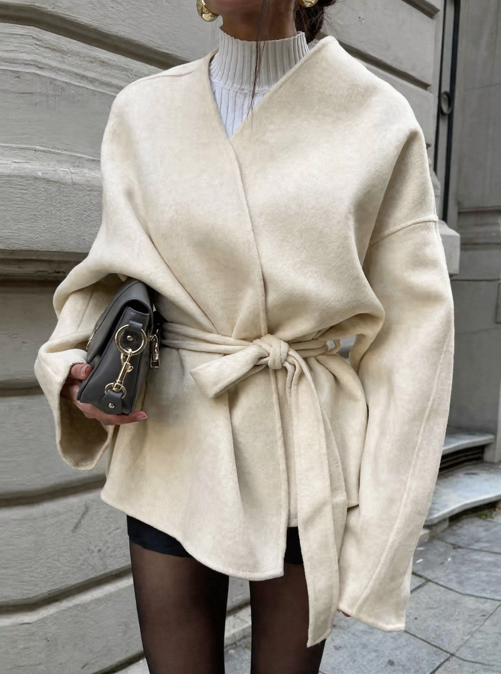 Women's belted cream jacket